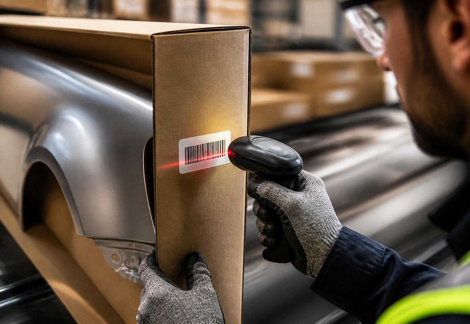 Warehouse team verifying a pull ticket against a scanned barcode